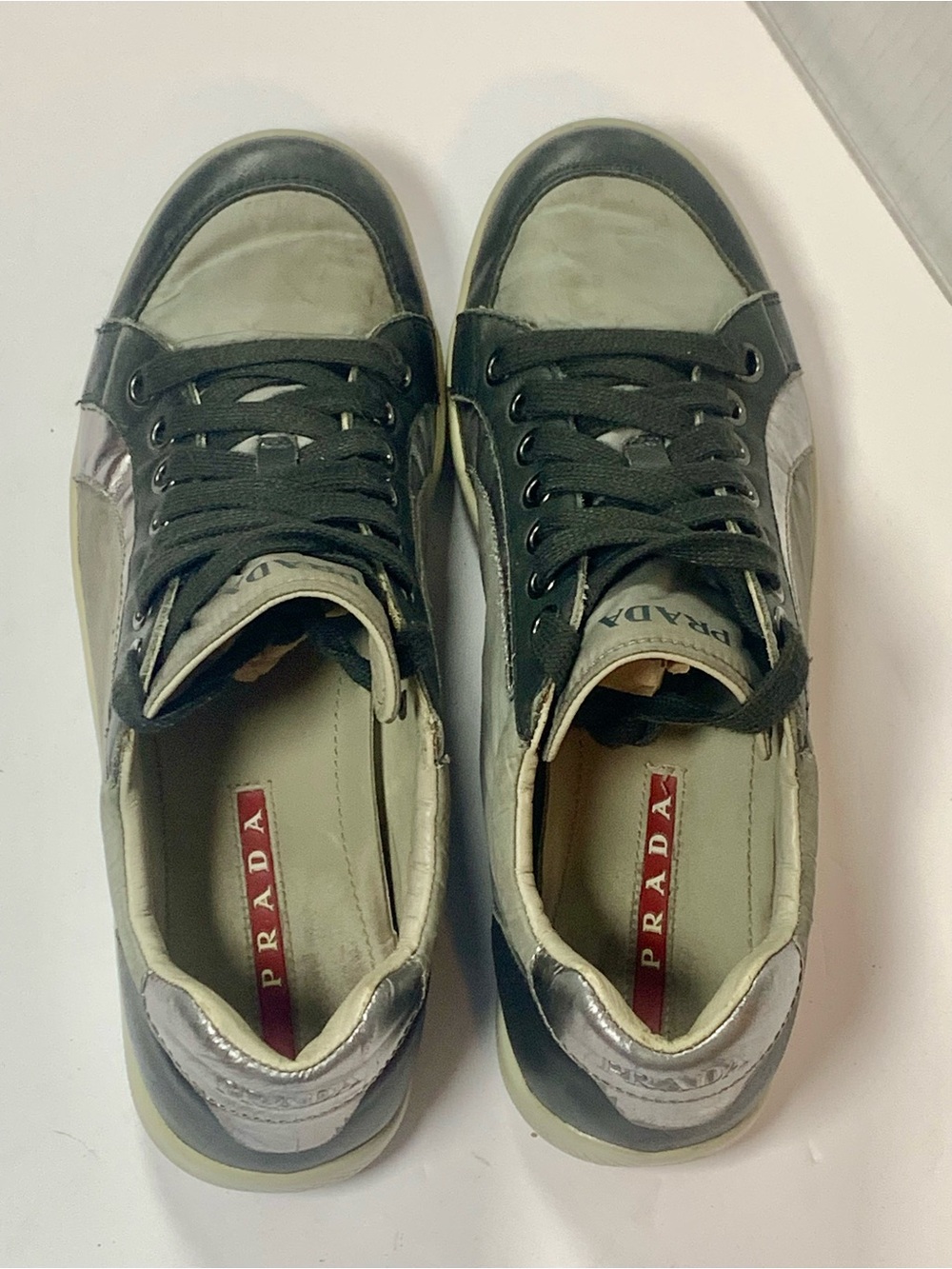 Prada Men’s Low-Top Sneakers in Black and Cream